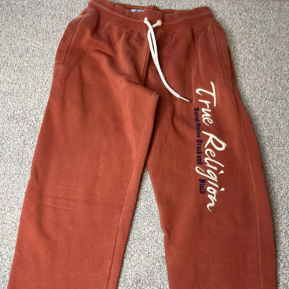 True Religion Rust Orange Sweatpants with White Logo
